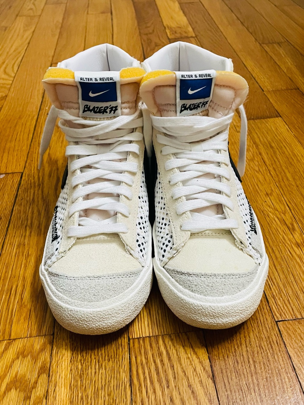 Nike Blazer 77 High Top Sneakers in White with Yellow and Blue Details
